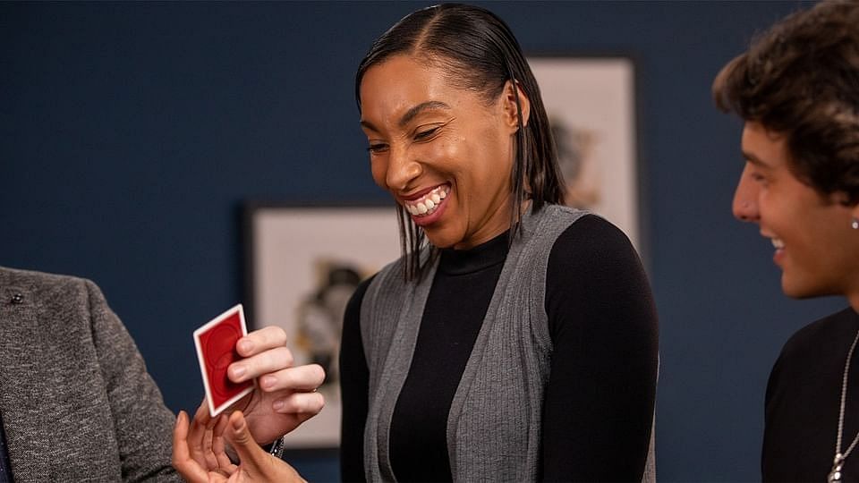 woman learns magic trick
