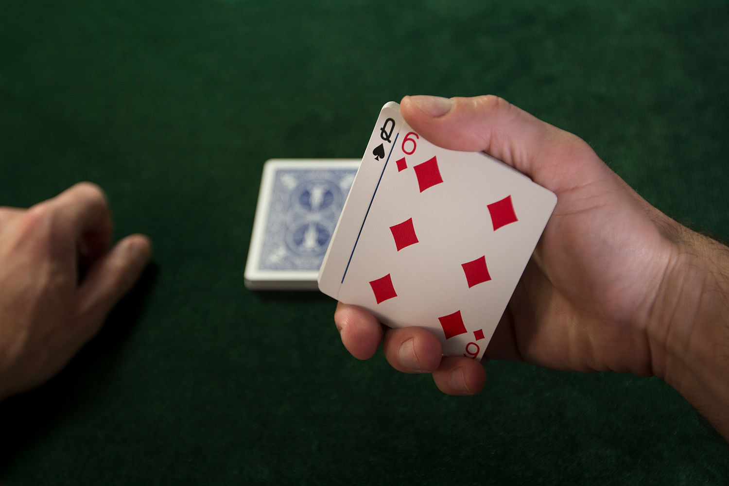 Peeking a card, a common method used by card cheats