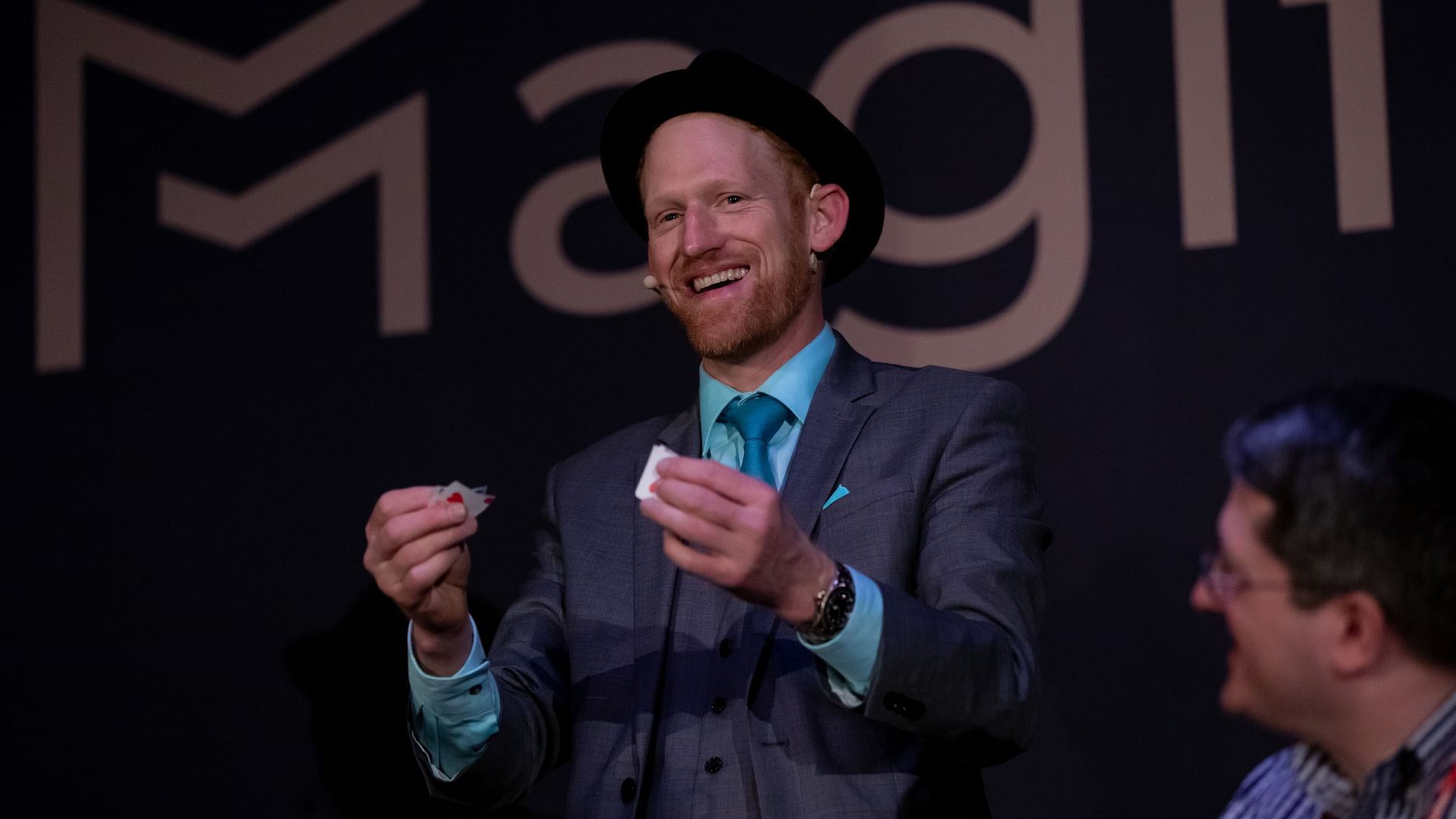 magician karl hein performs an amazing card trick during a magic show at a magic convention