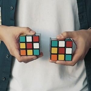 Two rubik's cubes match as part of a rubik's cube magic trick mentalist effect known as Venom Cube